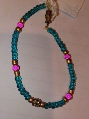 Handmade Teal Beaded Bracelet with Pink and Gold Accents
